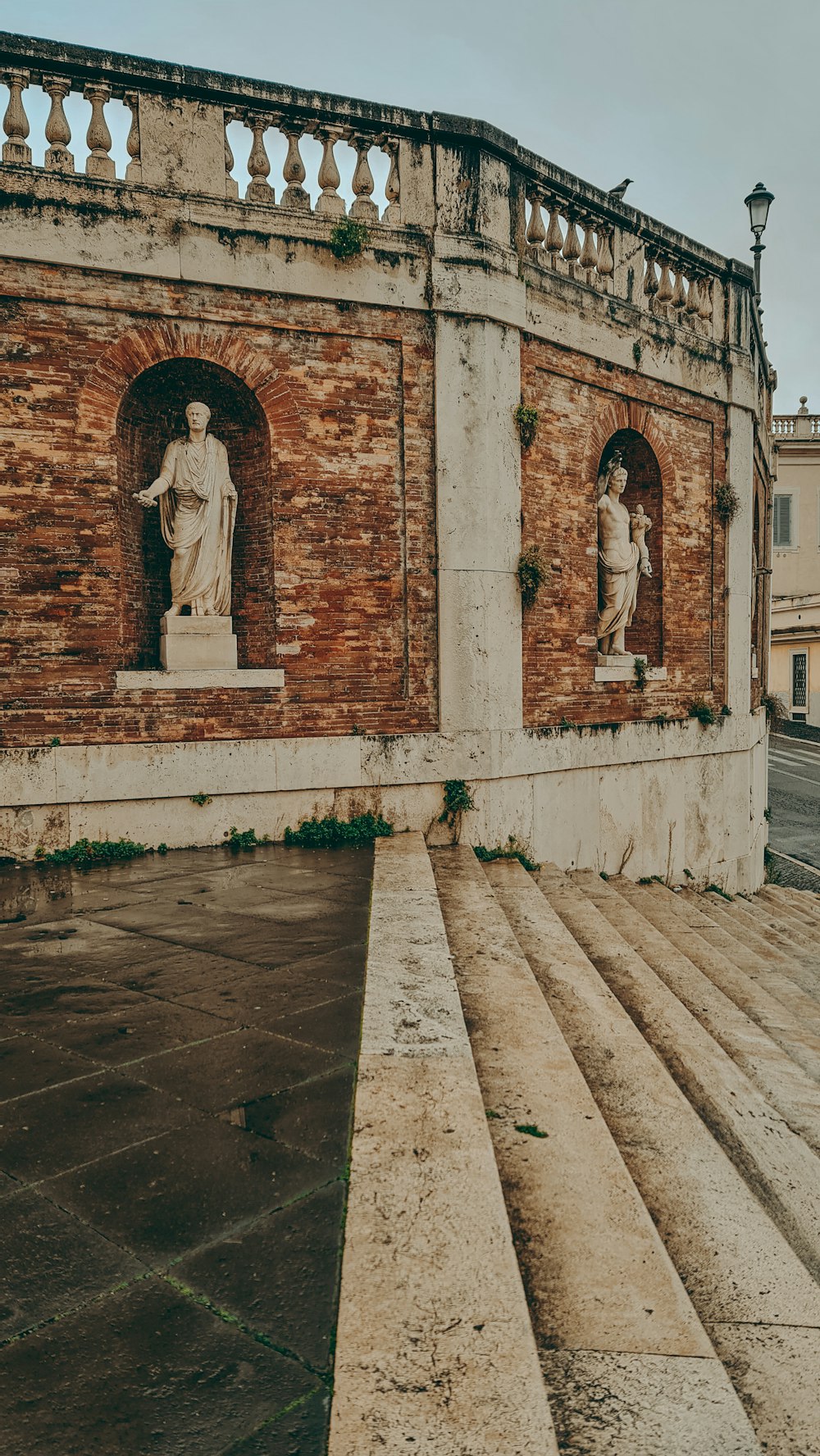 a building with statues on the side of it