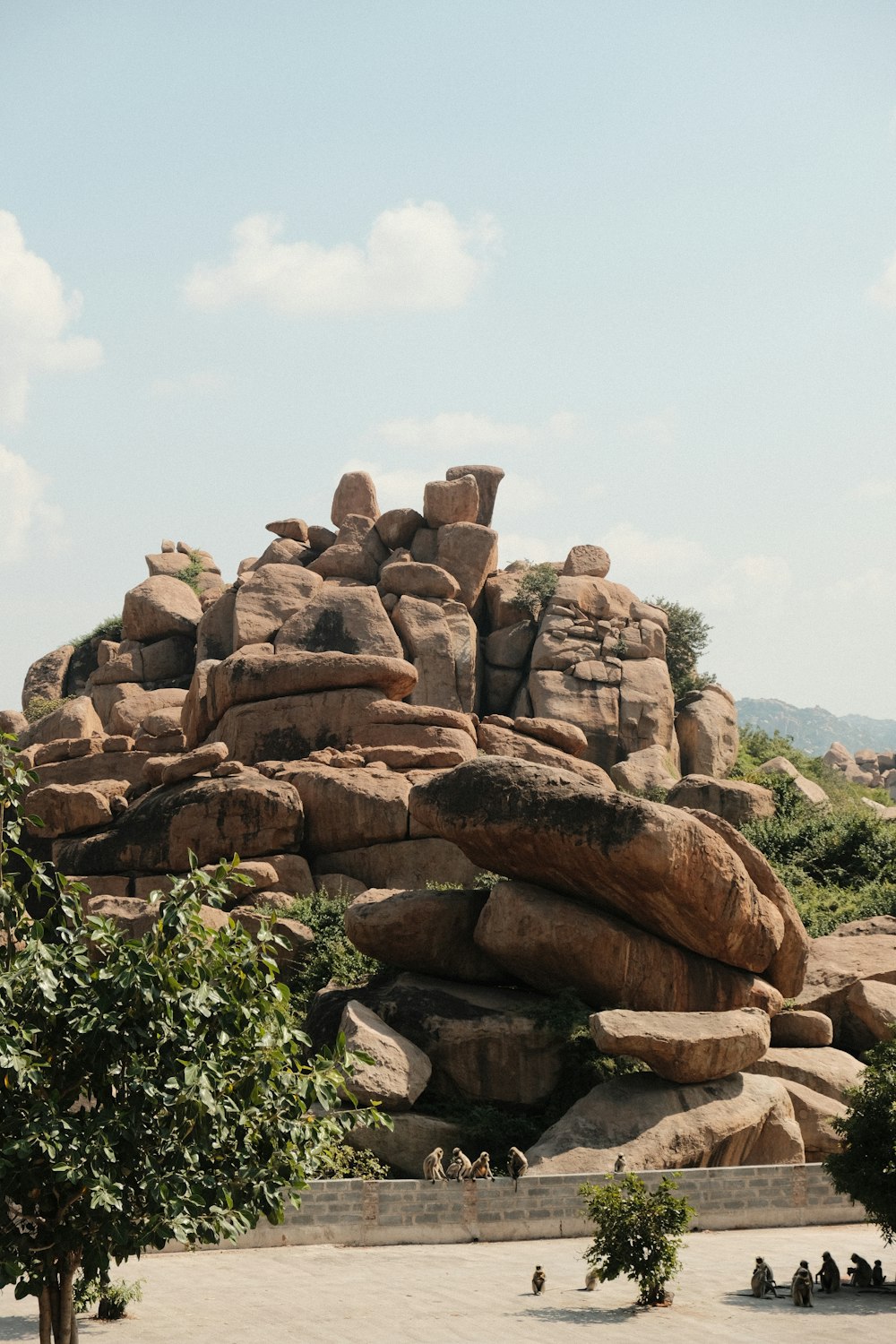 a large rock formation in the middle of a park