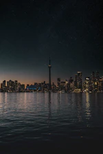 A sleek Toronto skyline at dusk with subtle AI data overlays glowing softly.