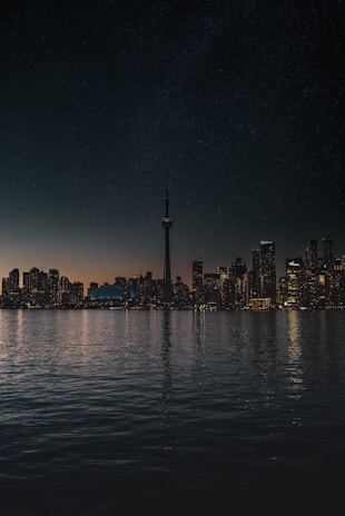 Electric cables and city textures glistening under Toronto’s night sky.