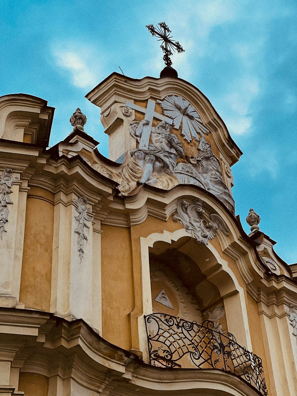 a building with a cross on top of it
