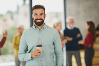 A candid shot of the guys grabbing coffee at their favorite local spot, chatting and joking before recording.