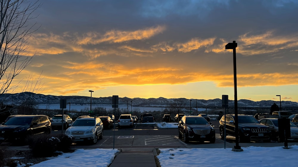 a parking lot filled with lots of parked cars