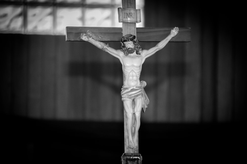 a black and white photo of a crucifix