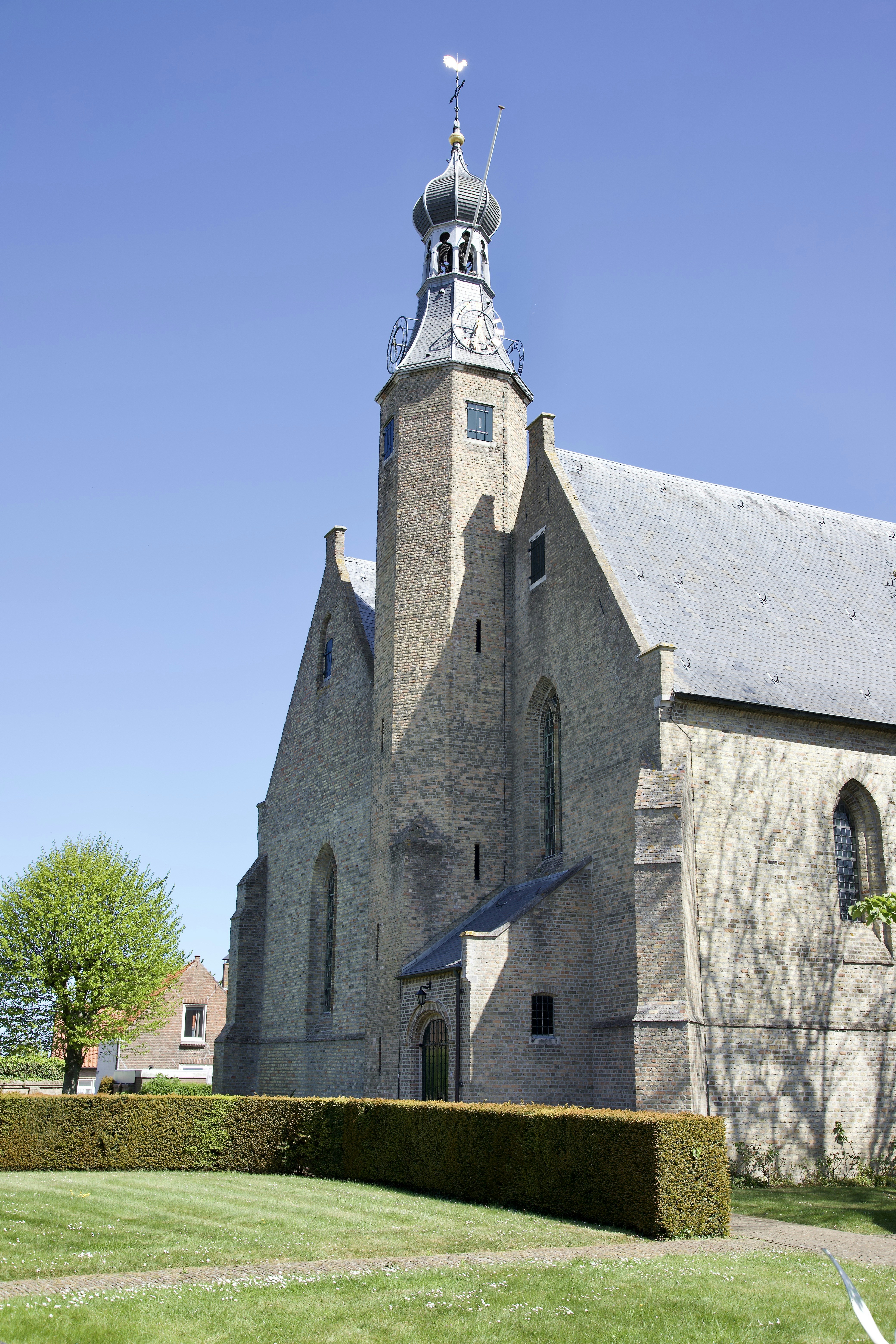 a church with a steeple and a clock tower