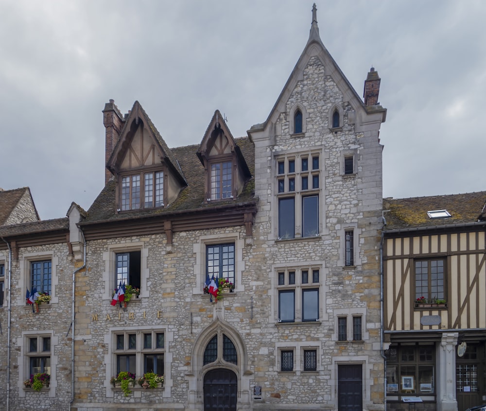 a large stone building with a clock tower