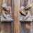 a close up of a wooden carving of two people