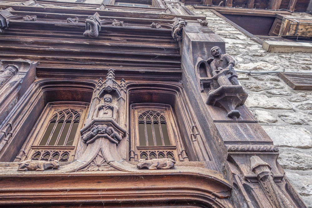 an old building with a clock on the front of it