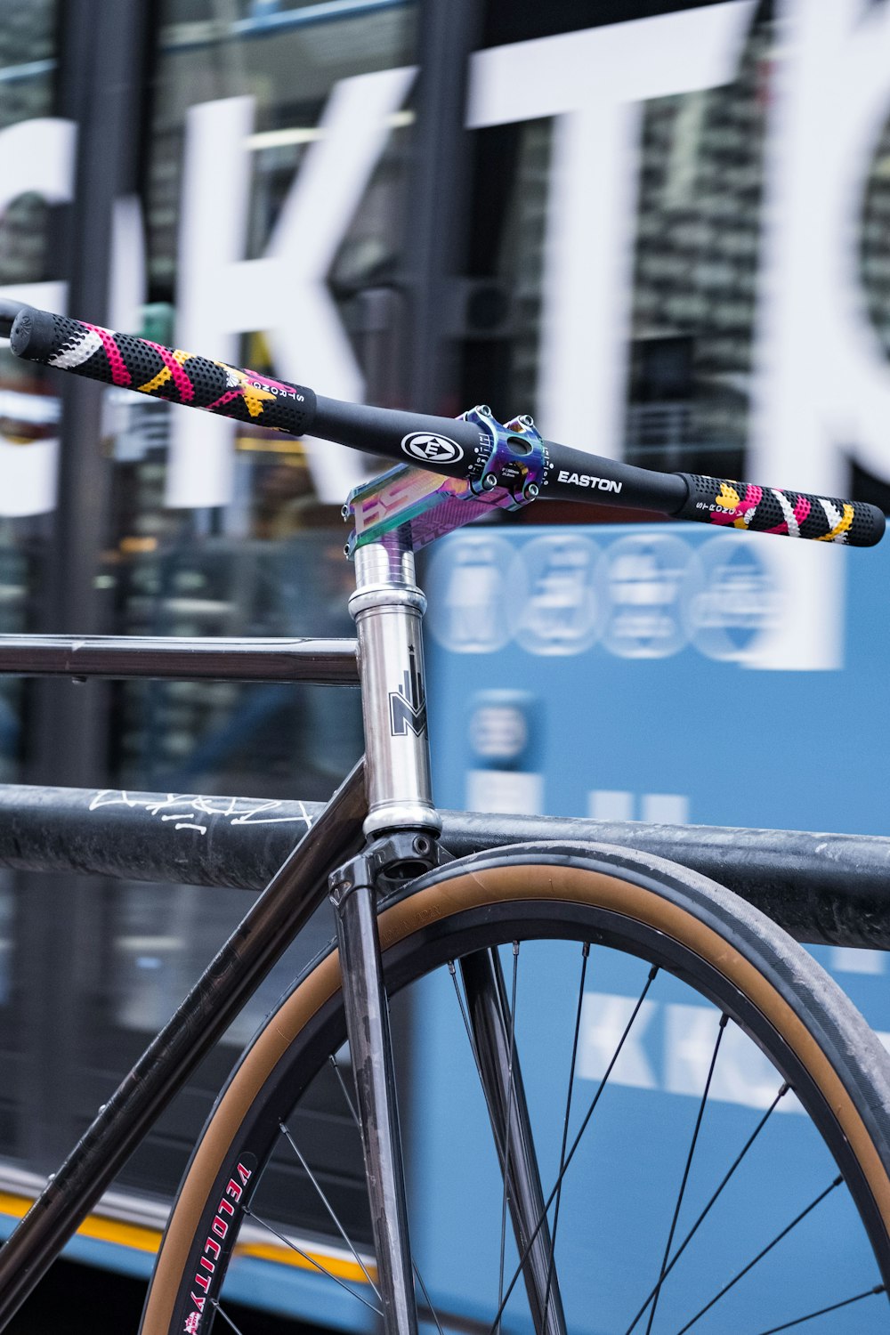 a close up of a bike on a city street