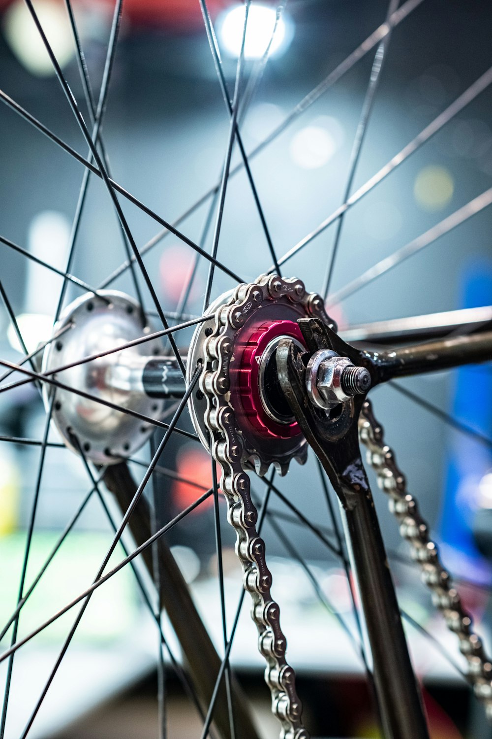 a close up of a bicycle wheel with a blurry background