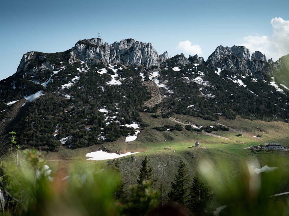 a view of a mountain with snow on it