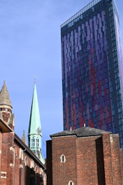 a church steeple with a blue sky in the background