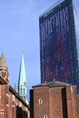 a church steeple with a blue sky in the background