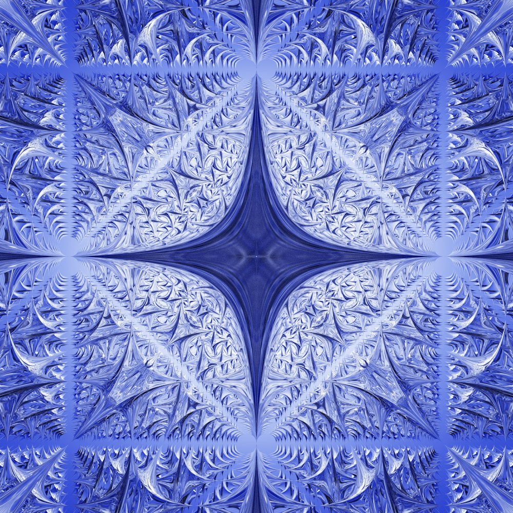 a blue and white photo of a flower