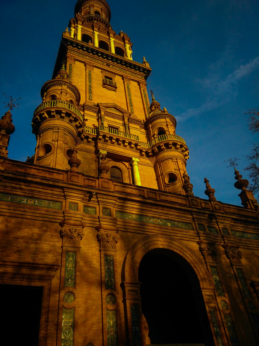 a tall tower with a clock on top of it