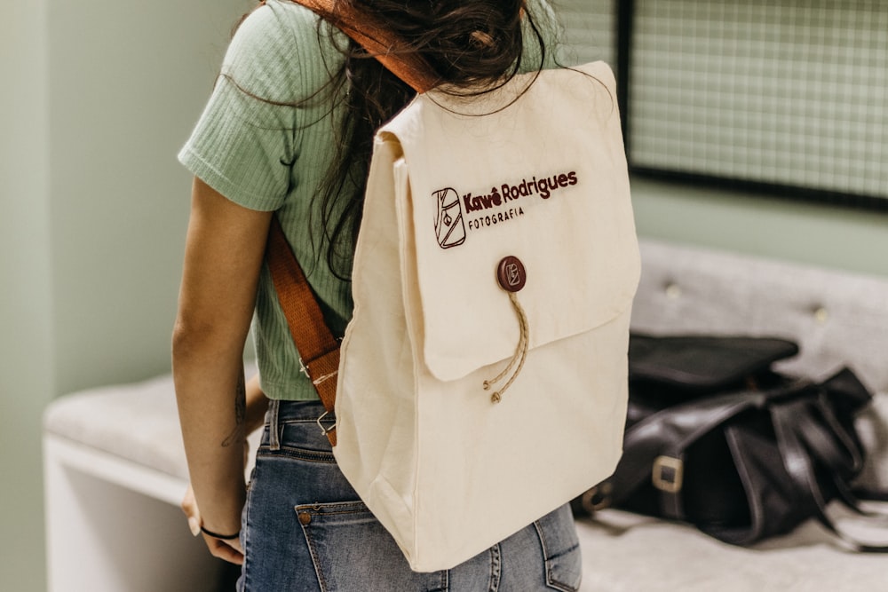 a woman with a backpack on her back