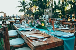 a table set up with place settings and place settings