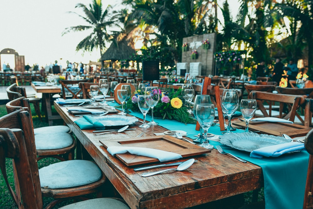 a table set up with place settings and place settings