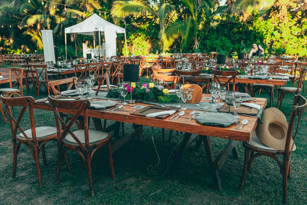 a table set up with place settings and place settings