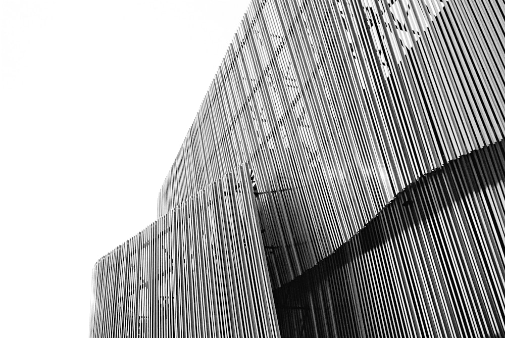 a black and white photo of a tall building