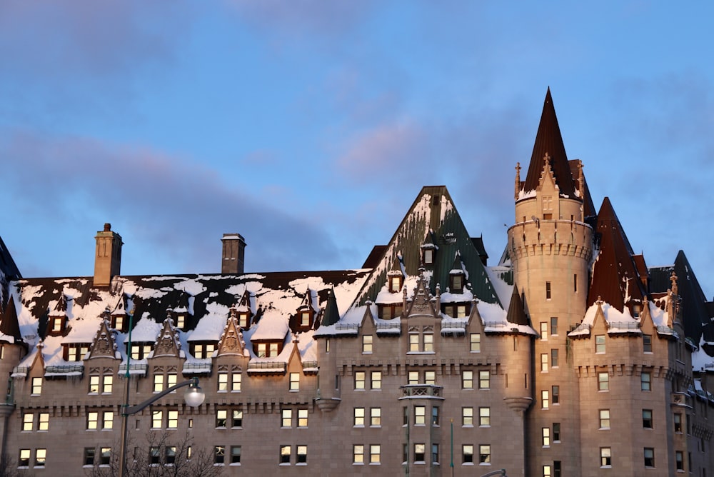 a large castle like building with a clock tower