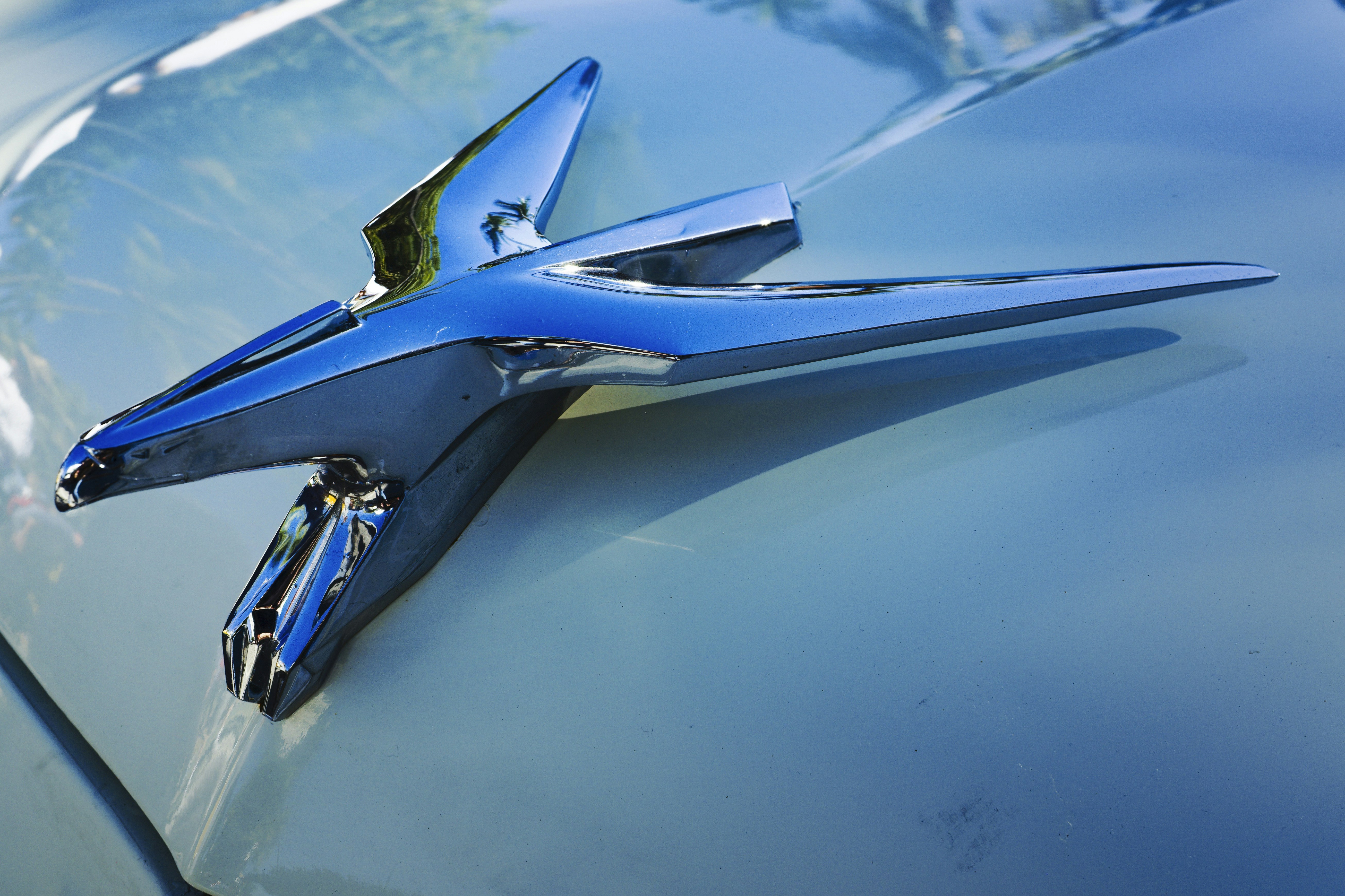 the hood ornament of a classic car