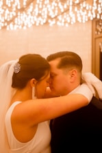Bride and groom sharing an intimate moment captured in cinematic documentary style.