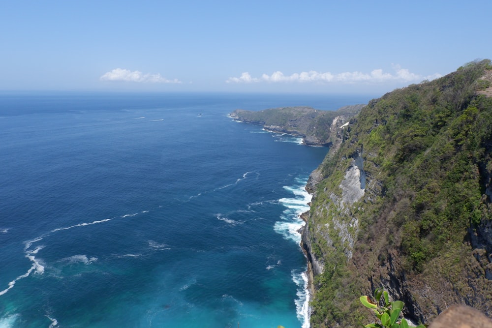 a view of the ocean from a cliff