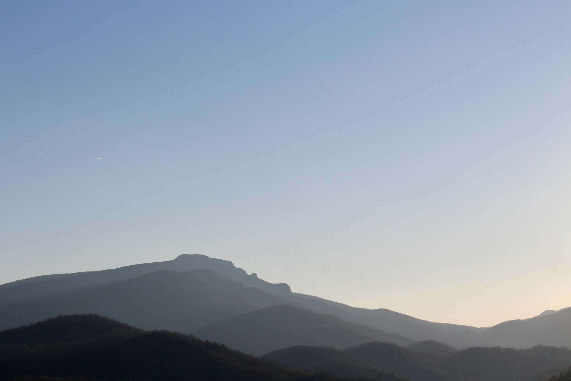 a view of a mountain range from a distance