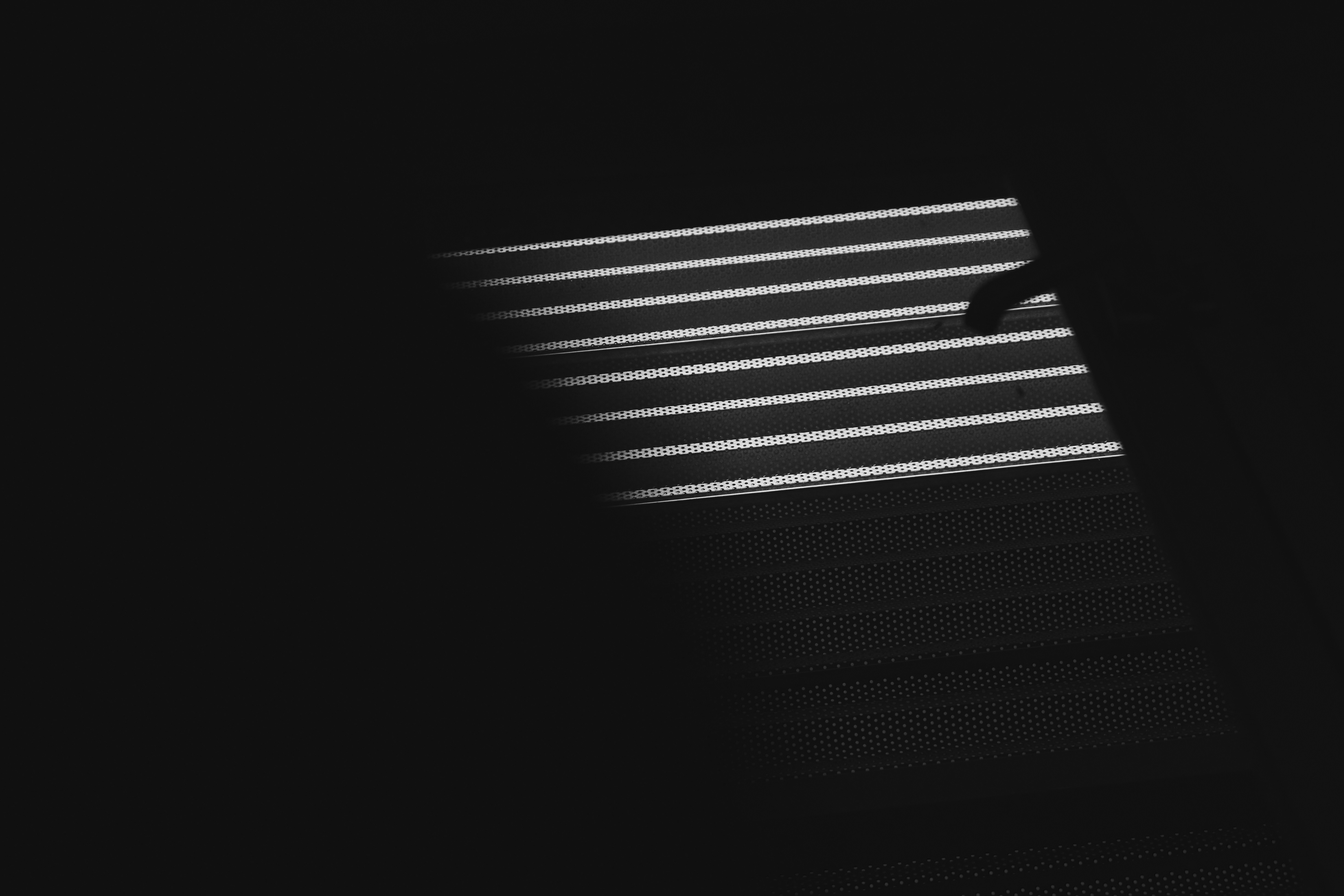 Shadow of a person in a dark room