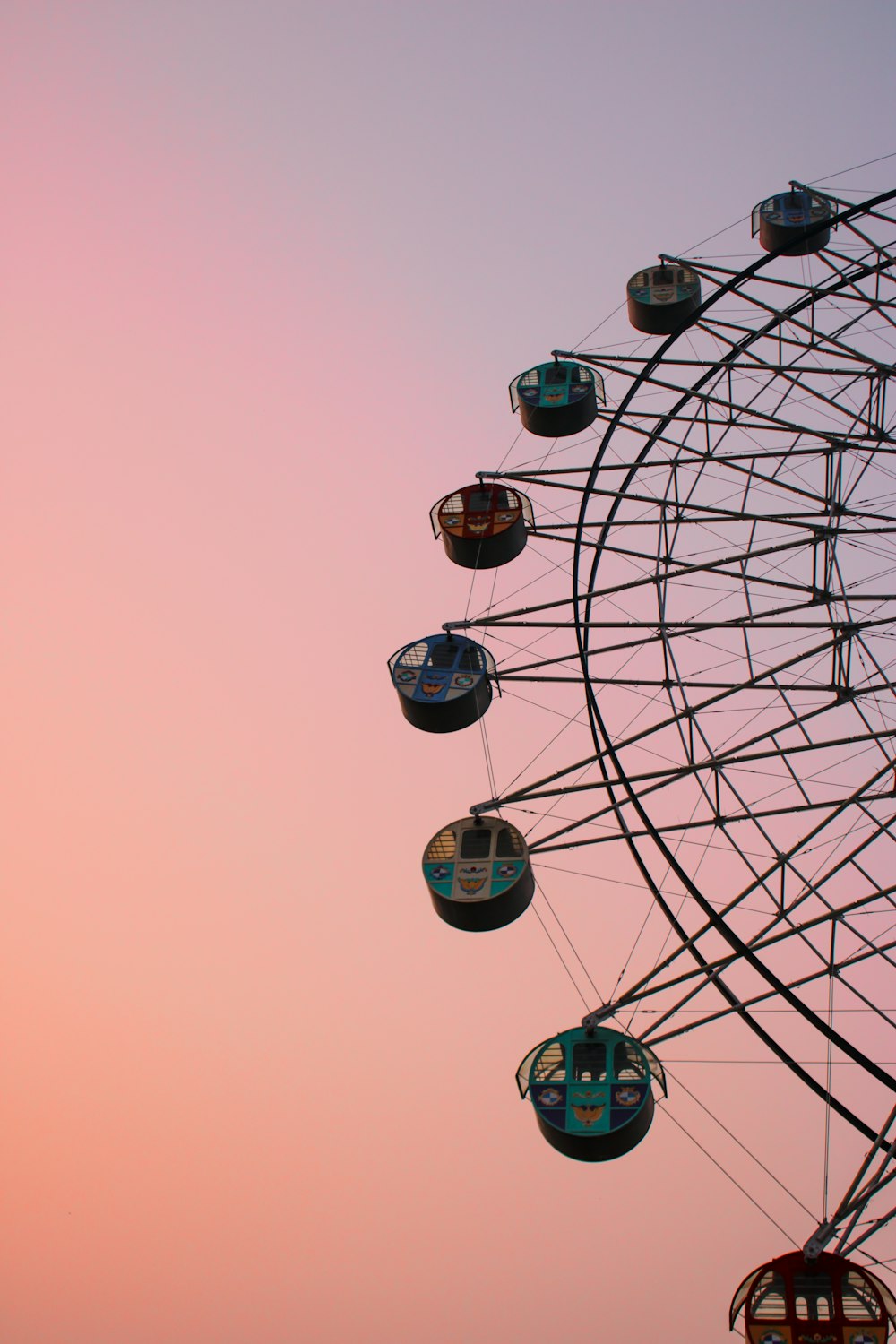 a ferris wheel with a sky in the background