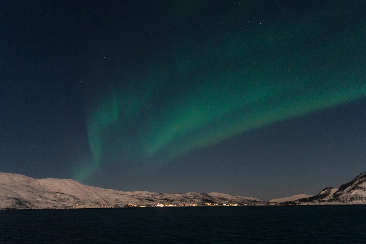 Lively Northern Lights dancing across the Arctic sky in Scandinavia