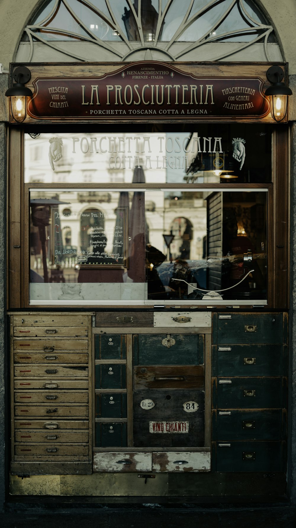 a store front with a lot of drawers in front of it