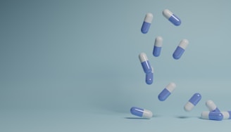 a group of pills falling into the air