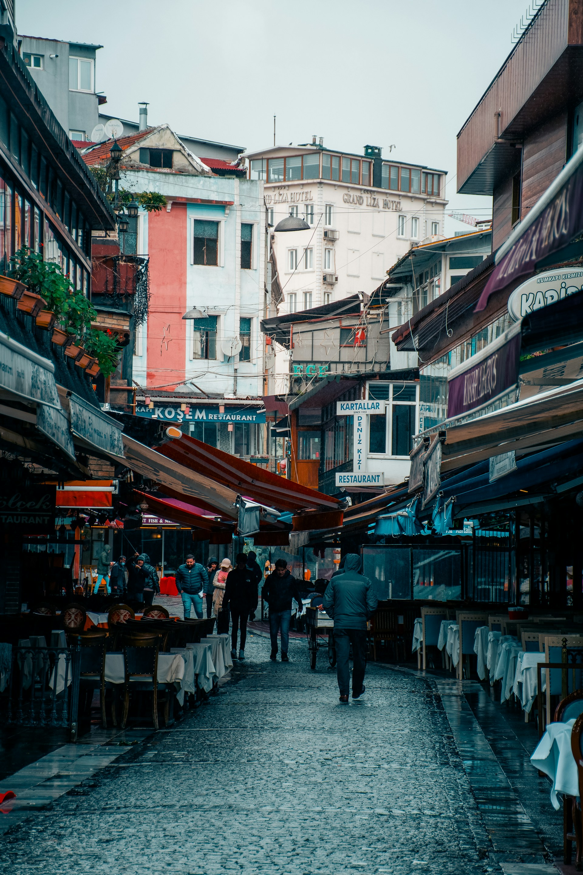 woman wearing yellow long-sleeved dress under white clouds and blue sky during daytime