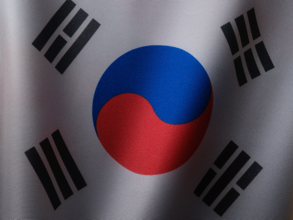 a close up of the flag of south korea