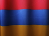 a close up of a red, blue, and yellow curtain