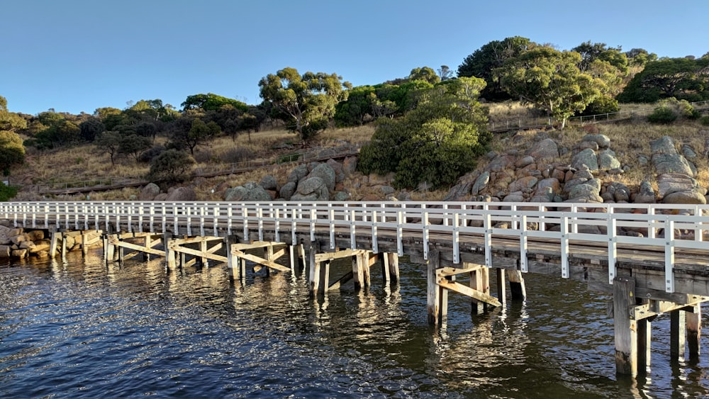 a long white bridge over a body of water