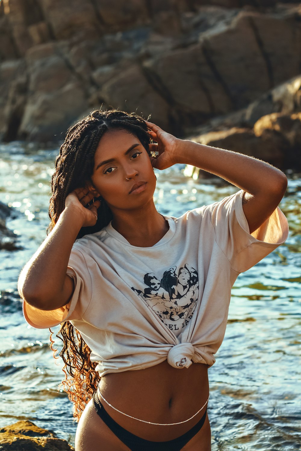 a woman standing in a body of water