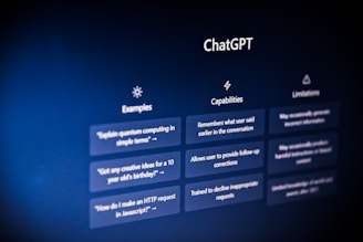 A screen displaying information about ChatGPT, including sections labeled 'Examples,' 'Capabilities,' and 'Limitations.' Each section contains a list of items in a clear, organized layout on a dark background.