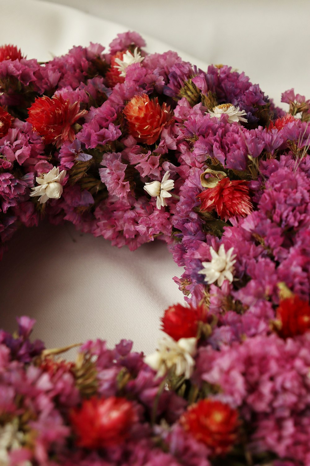 a close up of a wreath made of flowers