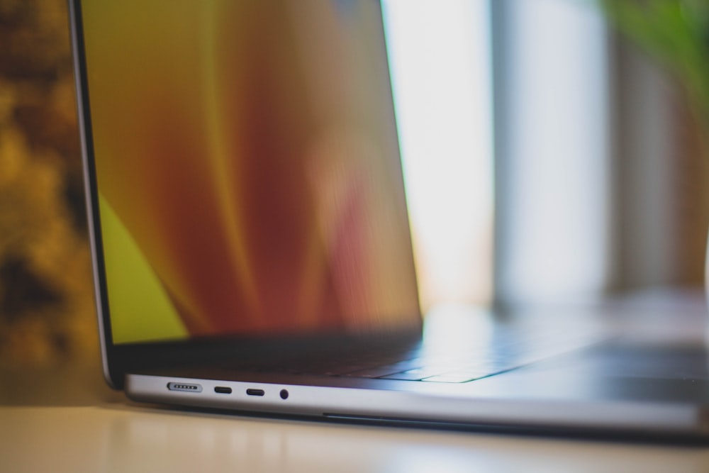 a close up of a laptop on a table