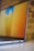 A close-up of a sleek laptop adorned with a vibrant skin design.