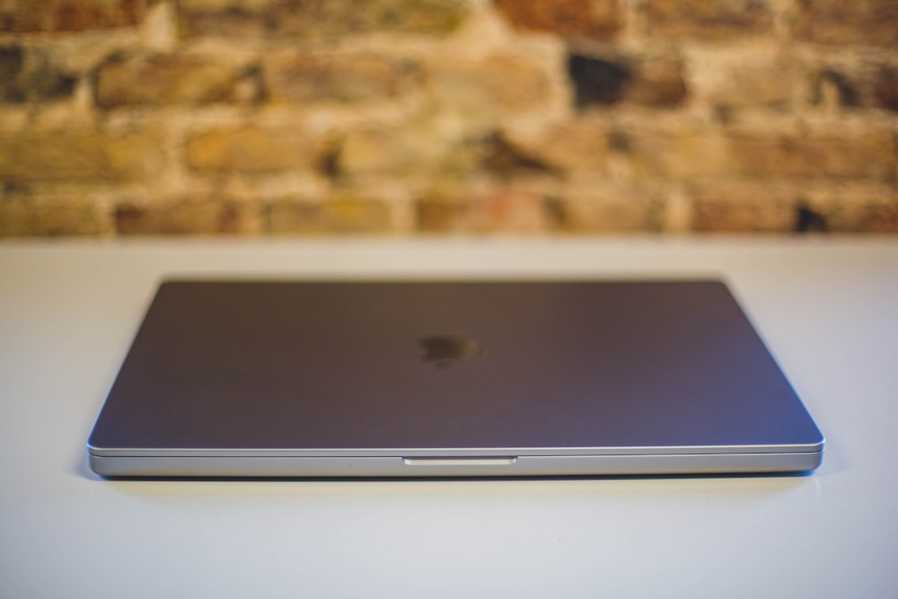 a close up of a laptop on a table