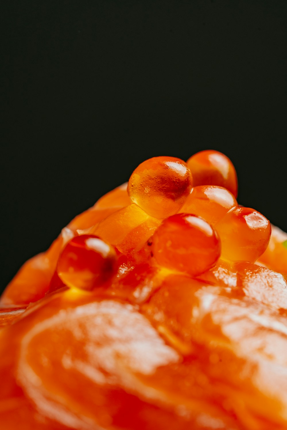 a close up of a jelly cake on a plate