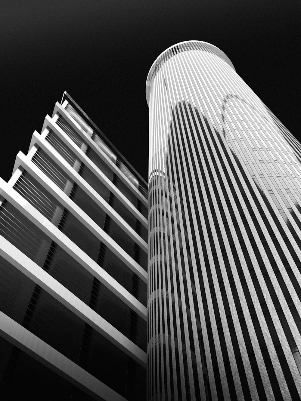 a black and white photo of a tall building