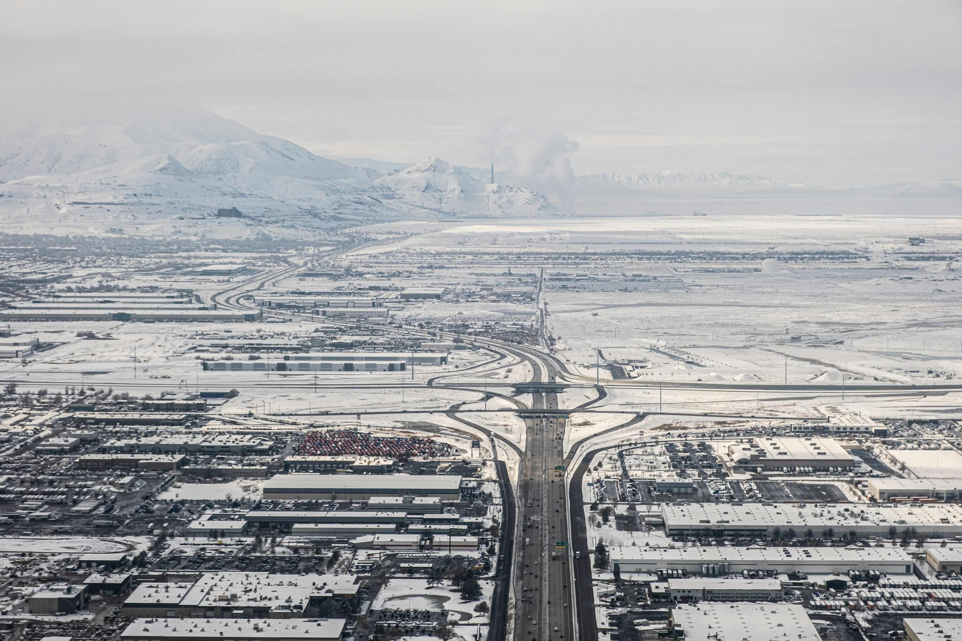 Infographic explaining Utah winter inversion mechanics and indoor air quality effects PM2.5