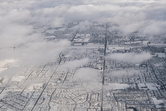 Map highlighting Coquitlam neighborhoods like City Centre, Maillardville, and Eagle Ridge with snowflake icons marking service coverage.