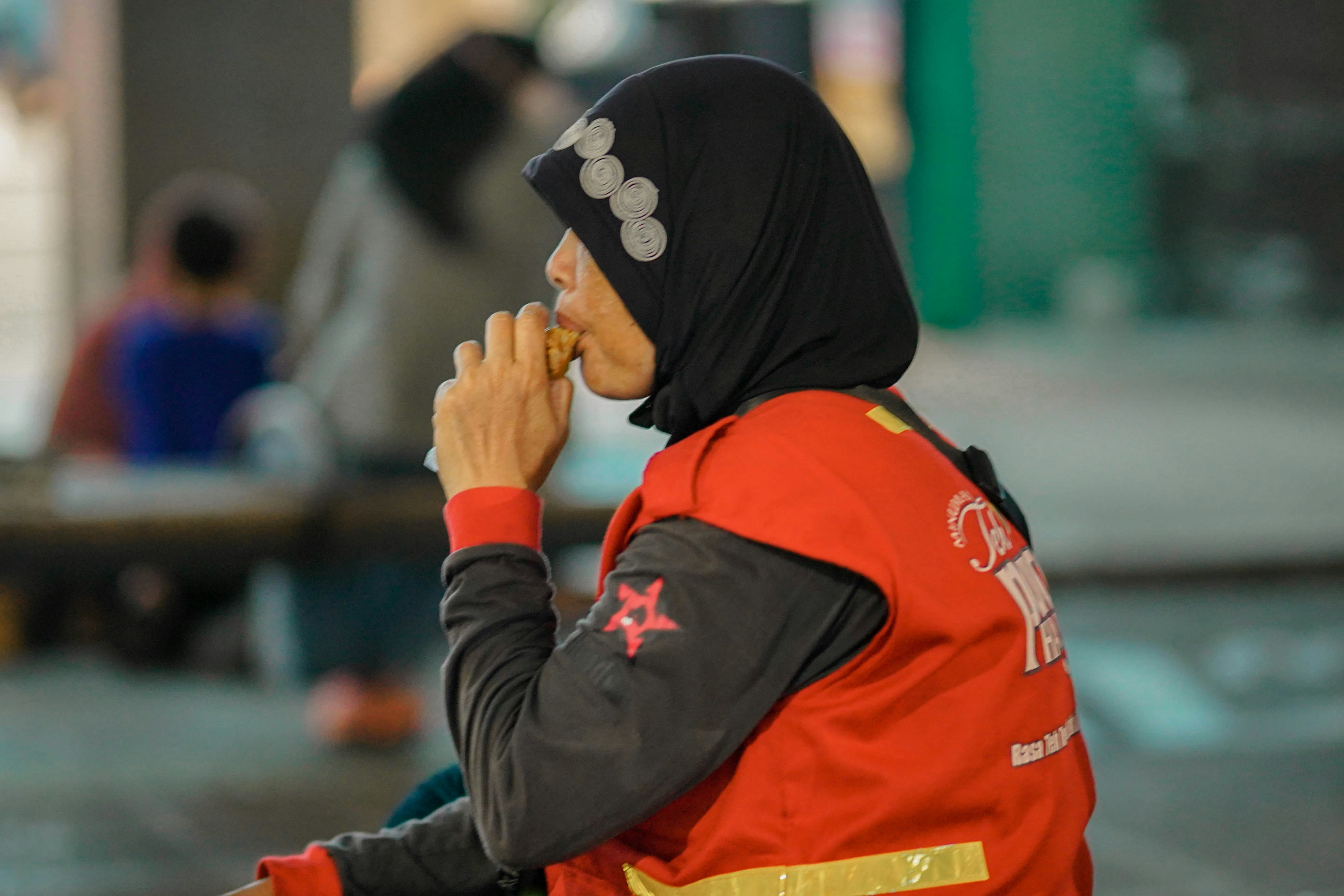 A person in a red jacket and a black hat photo – Free Woman Image on ...