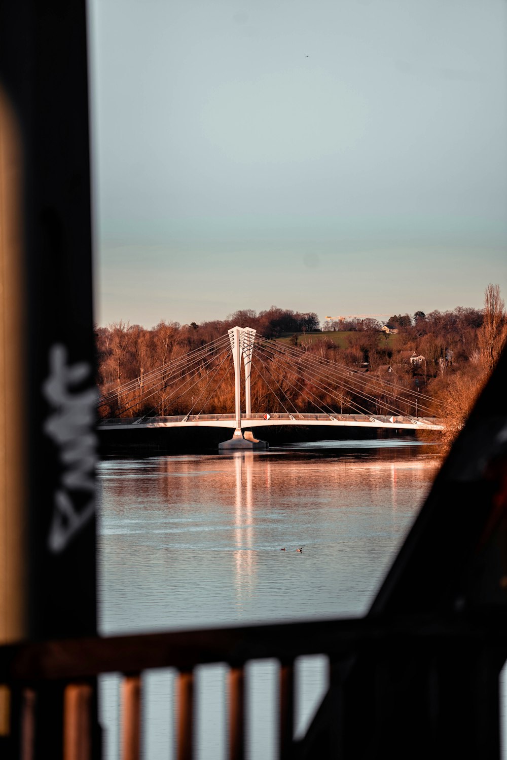 a view of a bridge over a body of water